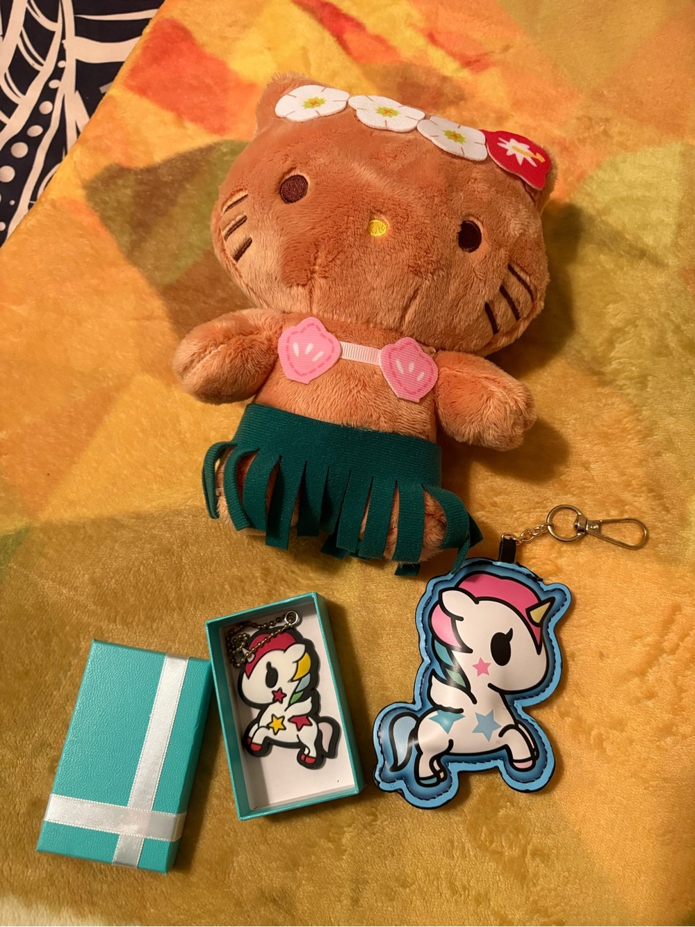 Cute Hello Kitty stuffed animal and Tokidoki Stellina Unicorno key chains